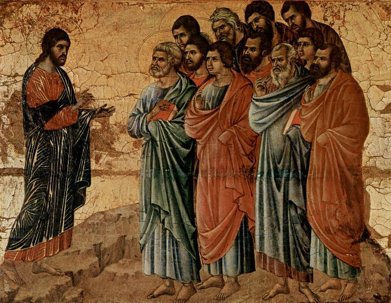 Duccio’s painted panel of the risen Christ, standing at left in a dark robe with his hands raised, speaking to the eleven haloed apostles crowded together on a rocky hillside.