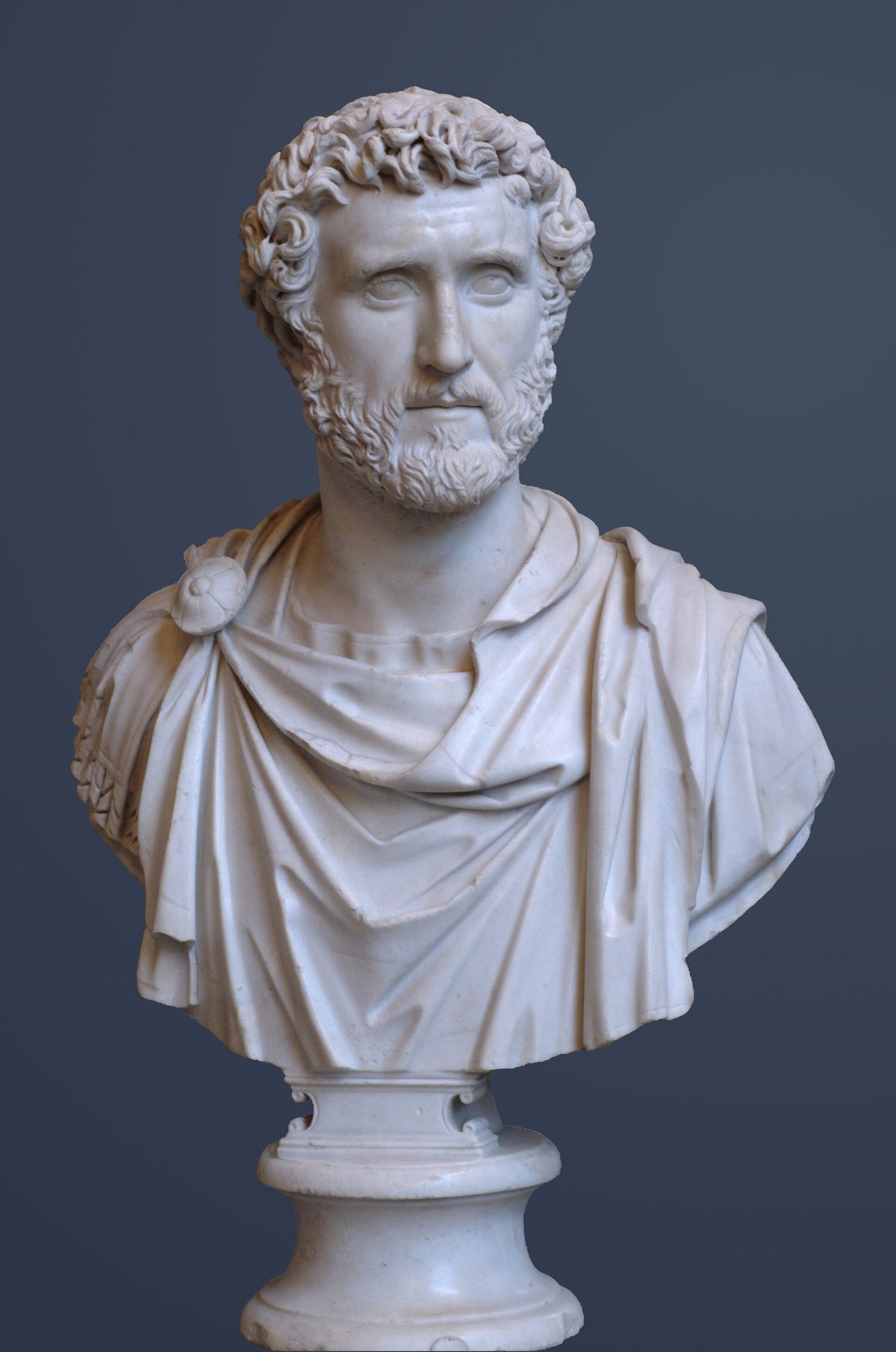 Marble bust of the Roman emperor Antoninus Pius, bearded and wearing a draped toga, in the Glyptothek, Munich