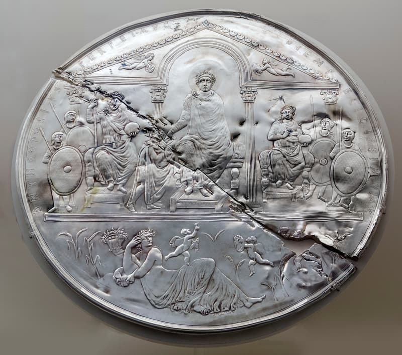 The Missorium of Theodosius I, a large ceremonial silver dish showing the emperor enthroned beneath an arch, flanked by his co-emperors and guards
