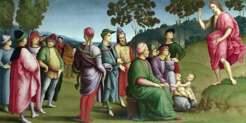 Raphael, Saint John the Baptist Preaching (1505): the Baptist stands at the right in a red mantle, addressing a seated crowd in a landscape—the forerunner whose role in the Fourth Gospel is summed up in a single word, witness.