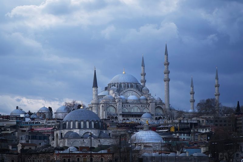 The Süleymaniye Mosque and historic Istanbul skyline at dusk, domes and minarets silhouetted against the clouds — Constantinople became the unchallenged power in the East after the Council of Chalcedon