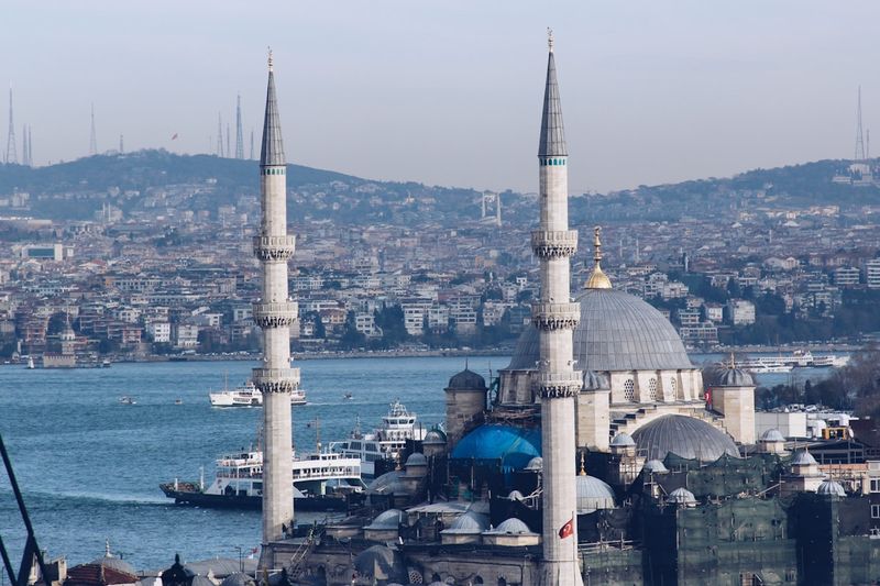 View of Istanbul's historic skyline from across the Bosphorus, with minarets and domes rising above the city — the site of ancient Constantinople, whose bishop gained supreme authority in the East after Chalcedon