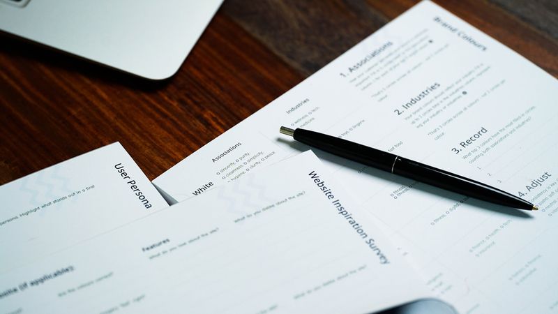 A pen resting on legal documents, representing the cy pres doctrine and nonprofit modification