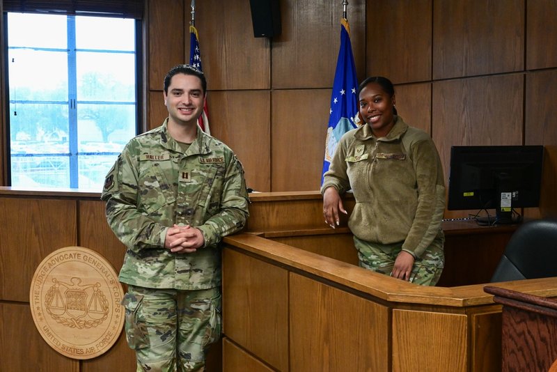 Air Force Judge Advocate and paralegal in a military courtroom at Barksdale Air Force Base