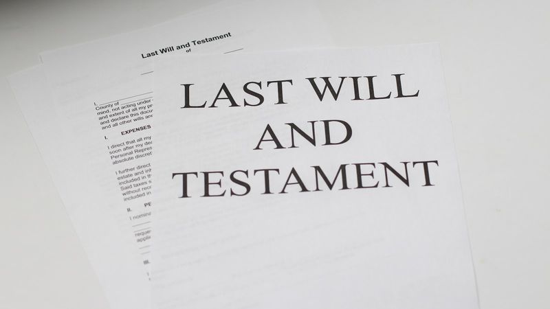 Printed Last Will and Testament documents on a white surface