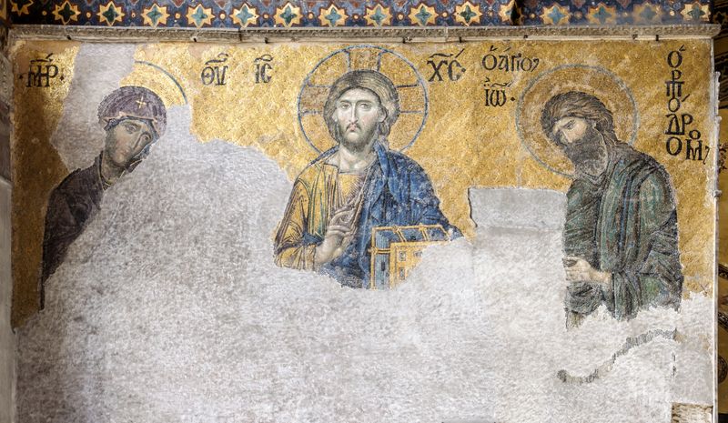 The Deësis mosaic in the Hagia Sophia, Istanbul, depicting Christ flanked by the Virgin Mary and John the Baptist — a masterpiece of Byzantine art at the crossroads of Eastern and Western Christianity.