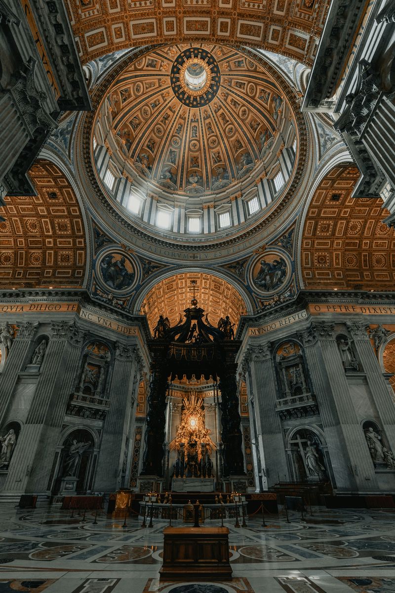 Interior of St. Peter's Basilica in Rome showing the dome and Bernini's baldachin